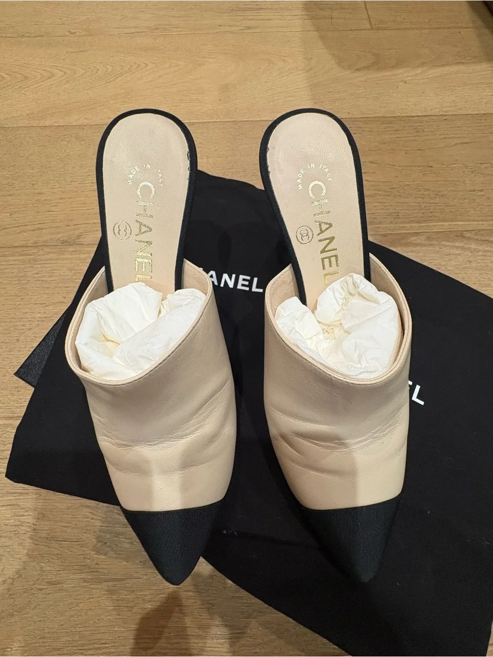 CHANEL Two-Tone Leather Mules with Pearl-Embellished Heel in White & Black